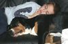 Grosser Schweizer Sennenhund Foto: Ufo des Joueses Gambades sleeps with our son Mikkel (ID 9736) Grosser Schweizer Sennenhund Hund